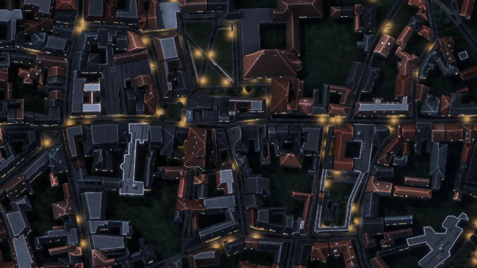 Hardpan screenshot: an old town at night seen from above, streets lit by lamps between red and grey roofs.
